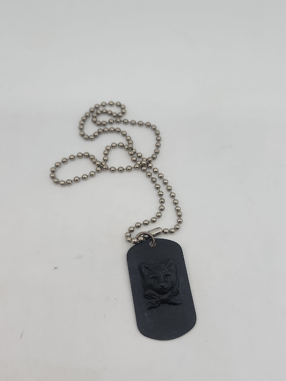 FLAT BLACK KITTU DOG TAG WITH CHAIN SHOWN